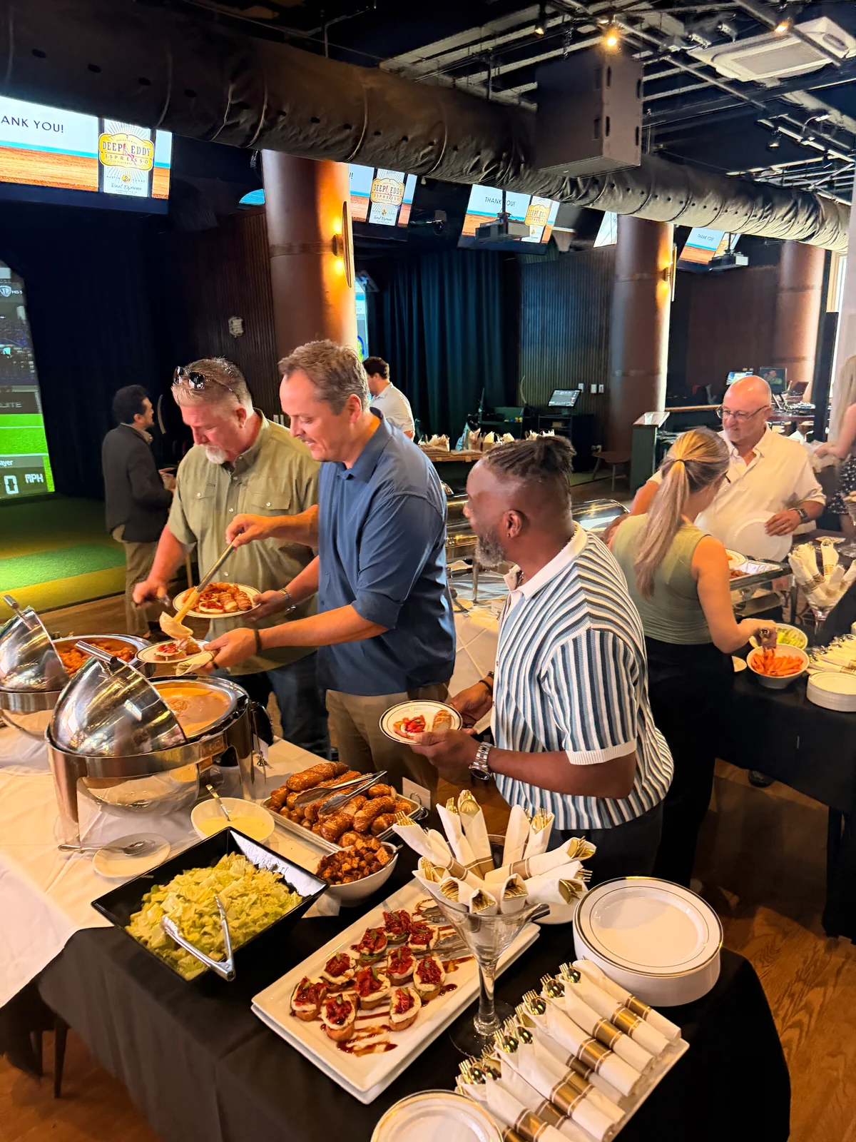 Guests helping themselves to food at a PSC event