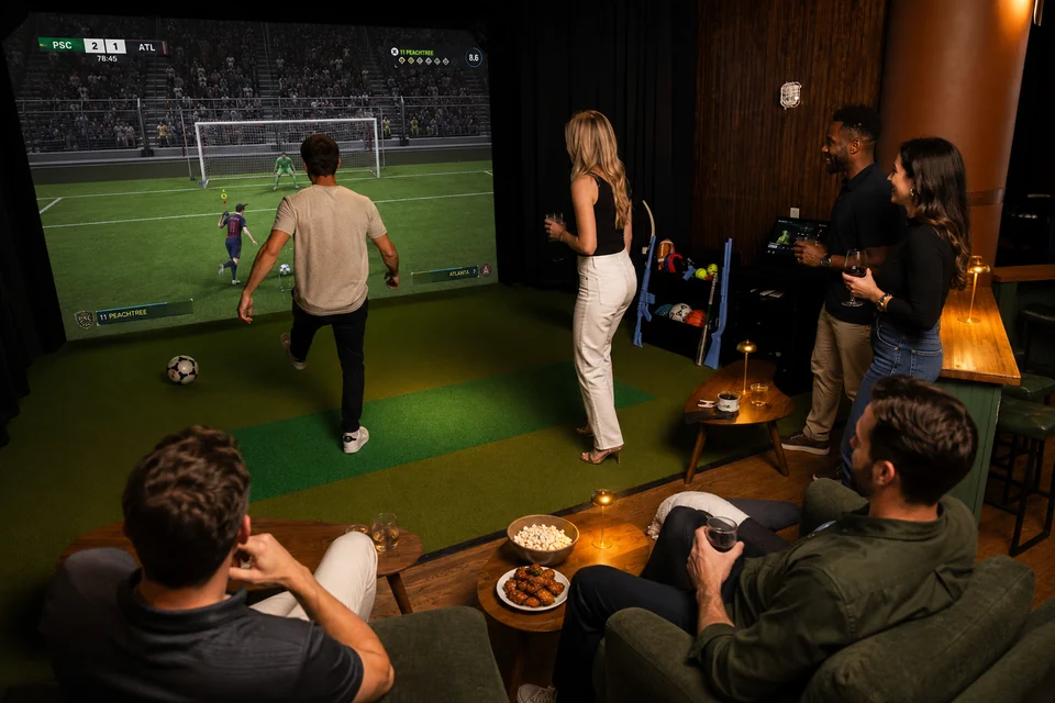 Illustration of a group enjoying soccer in a sports suite